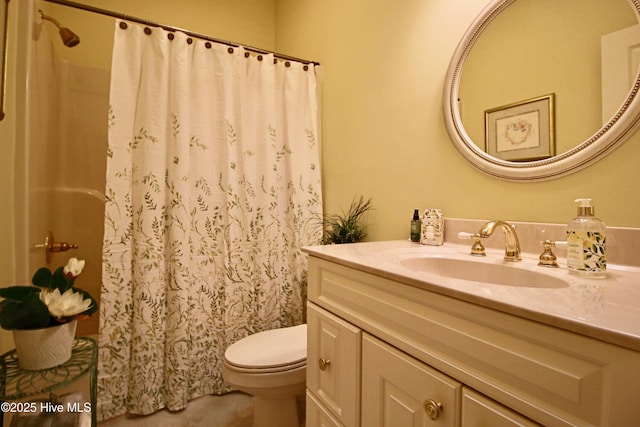 full bathroom featuring tile patterned floors, toilet, vanity, and a shower with shower curtain