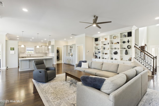 living room featuring ornamental molding, dark wood finished floors, visible vents, ceiling fan, and recessed lighting