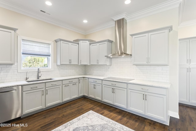 kitchen featuring black electric cooktop, gray cabinetry, stainless steel dishwasher, a sink, and wall chimney exhaust hood