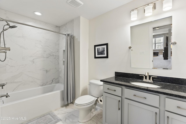 full bathroom with visible vents, marble finish floor, toilet, vanity, and shower / tub combo