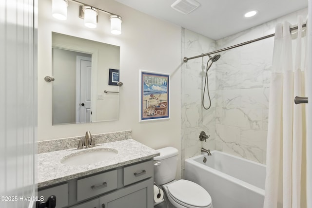 full bath featuring toilet, vanity, shower / bath combo, and visible vents