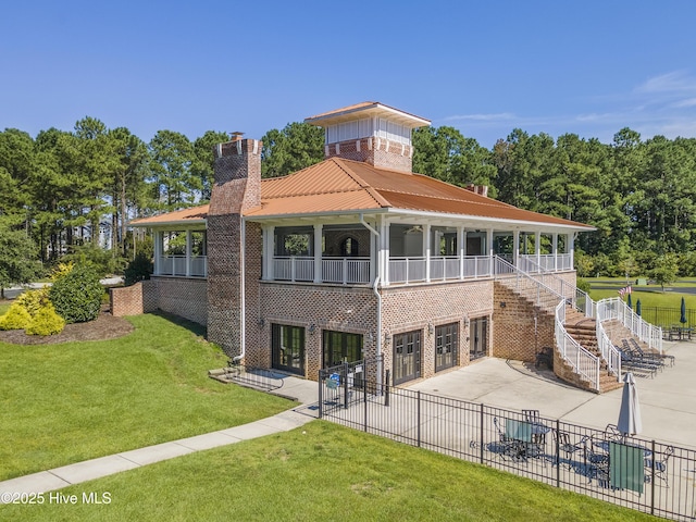 exterior space featuring a garage, concrete driveway, stairway, and fence