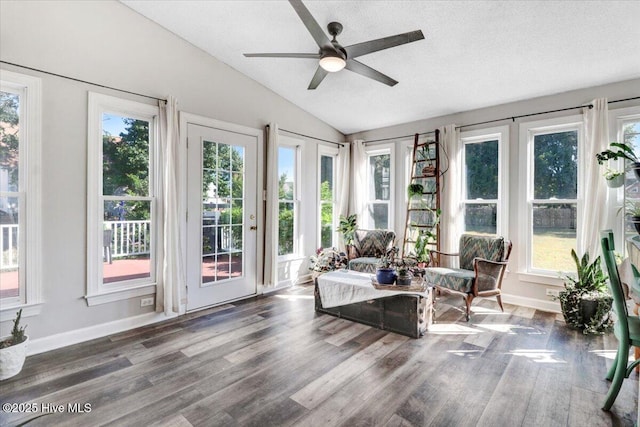 103 Roundtree Ln, Goldsboro, NC 27530 - sunroom with vaulted ceiling, wood finished floors, plenty of natural light, baseboards, and a textured ceiling