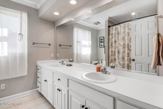 103 Roundtree Ln, Goldsboro, NC 27530 - full bath featuring ornamental molding, baseboards, double vanity, and recessed lighting