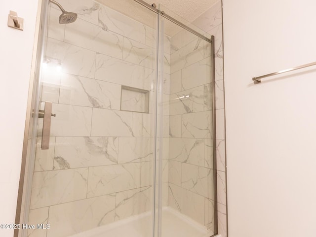 full bathroom with a stall shower