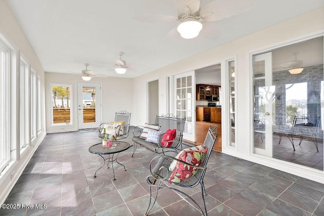 sunroom featuring french doors