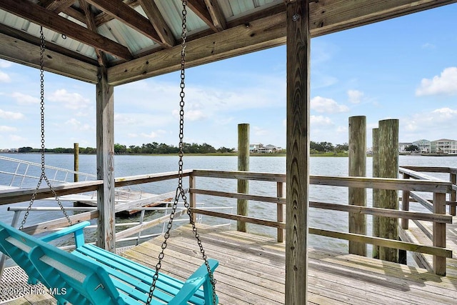 dock area with a water view