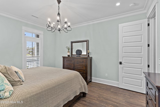 114 Sundance Cir, Hampstead, NC 28443 - bedroom featuring a chandelier, dark wood-type flooring, baseboards, and crown molding