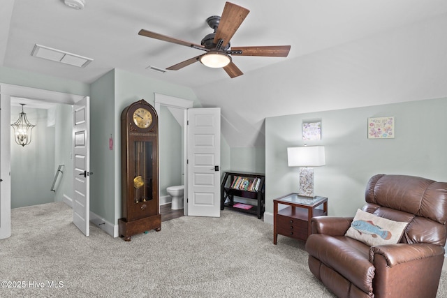 114 Sundance Cir, Hampstead, NC 28443 - living area featuring light colored carpet, a ceiling fan, a chandelier, vaulted ceiling, and baseboards