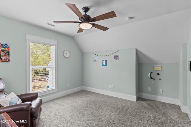 114 Sundance Cir, Hampstead, NC 28443 - living area with ceiling fan, lofted ceiling, carpet floors, and baseboards