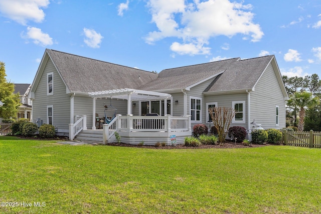 114 Sundance Cir, Hampstead, NC 28443 - back of house with a pergola, a deck, and a shingled roof