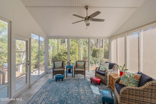 sunroom featuring ceiling fan