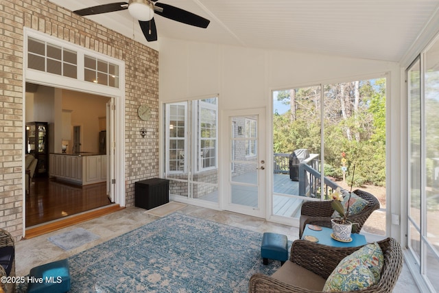 sunroom / solarium with ceiling fan
