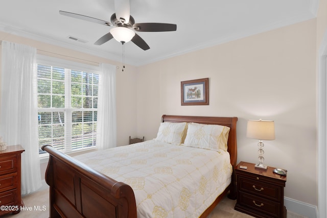 bedroom featuring light colored carpet, visible vents, crown molding, and ceiling fan