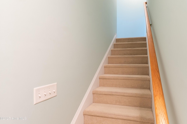 stairway with baseboards
