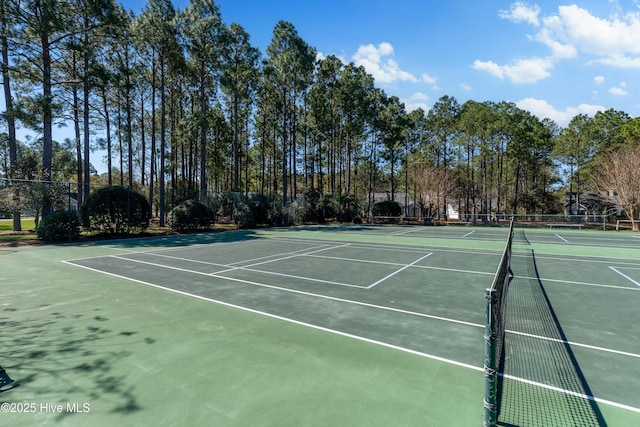 view of sport court featuring fence and community basketball court