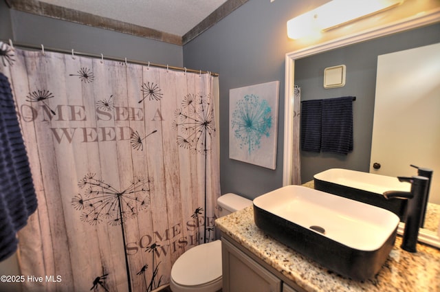 10170 Beach Dr SW Unit 305, Calabash, NC 28467 - full bath with toilet, vanity, and a shower with curtain
