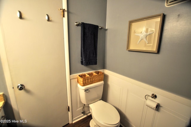 10170 Beach Dr SW Unit 305, Calabash, NC 28467 - bathroom featuring toilet and a wall mounted AC