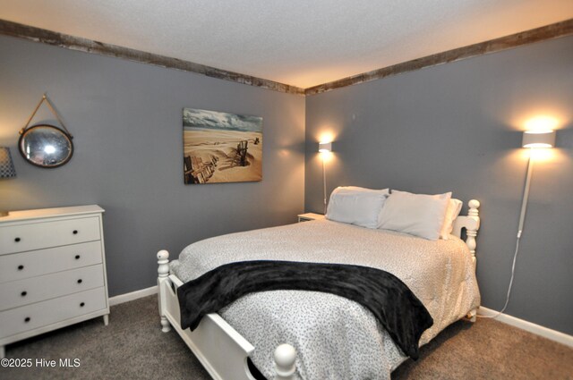 10170 Beach Dr SW Unit 305, Calabash, NC 28467 - bedroom featuring dark colored carpet and baseboards