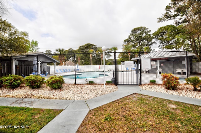 10170 Beach Dr SW Unit 305, Calabash, NC 28467 - community pool featuring a gazebo and a gate