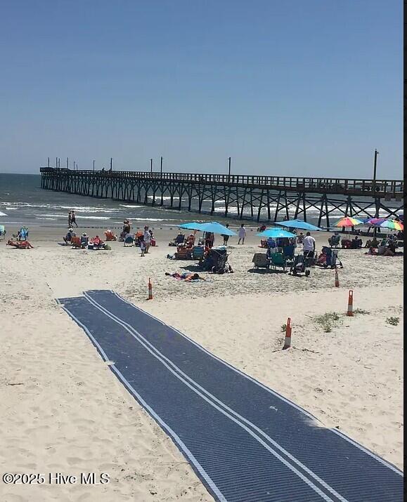 10170 Beach Dr SW Unit 305, Calabash, NC 28467 - surrounding community with view of water and beach