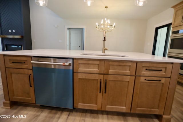 130 Gails Rd, West End, NC 27376 - kitchen with dishwashing machine, wood finished floors, and light countertops