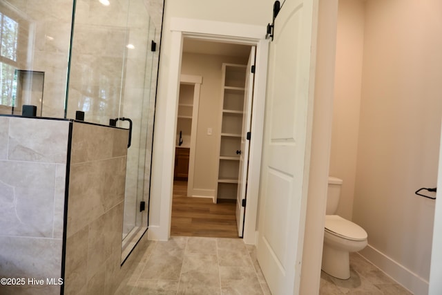 130 Gails Rd, West End, NC 27376 - full bathroom featuring a stall shower and a walk in closet