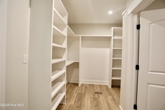 130 Gails Rd, West End, NC 27376 - spacious closet featuring wood finished floors