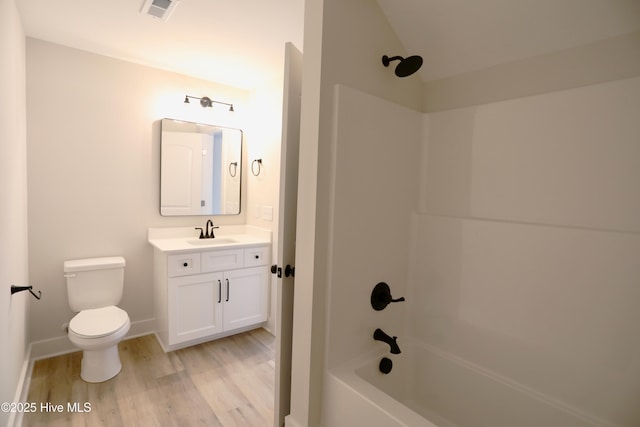 130 Gails Rd, West End, NC 27376 - bathroom with wood finished floors, bathtub / shower combination, vanity, and vaulted ceiling