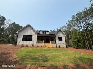 130 Gails Rd, West End, NC 27376 - view of front of home featuring crawl space, a front yard, and covered porch