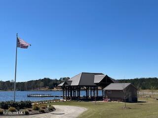 130 Gails Rd, West End, NC 27376 - view of property's community with a water view and a yard