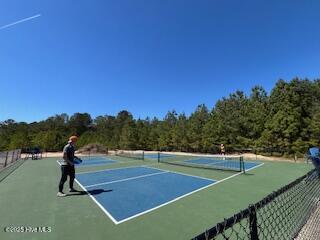 130 Gails Rd, West End, NC 27376 - view of tennis court with community basketball court