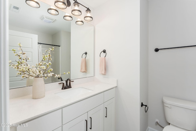 full bath featuring visible vents, toilet, and vanity