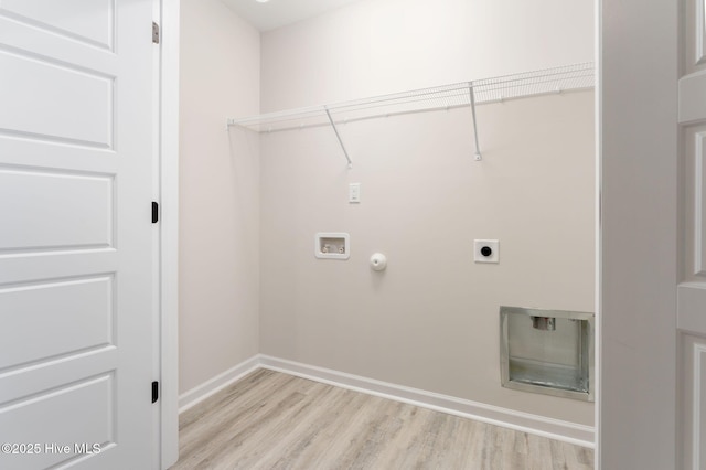 laundry room featuring light wood-style flooring, hookup for a gas dryer, washer hookup, laundry area, and hookup for an electric dryer
