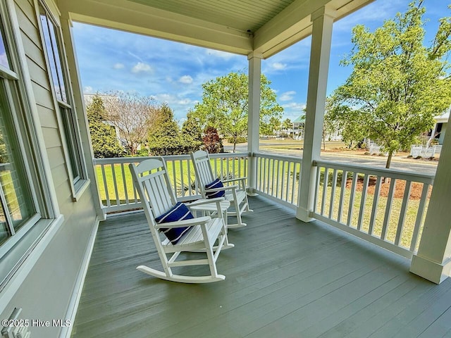 wooden deck with covered porch