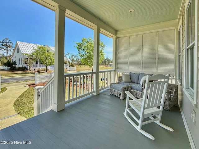 wooden deck with a porch