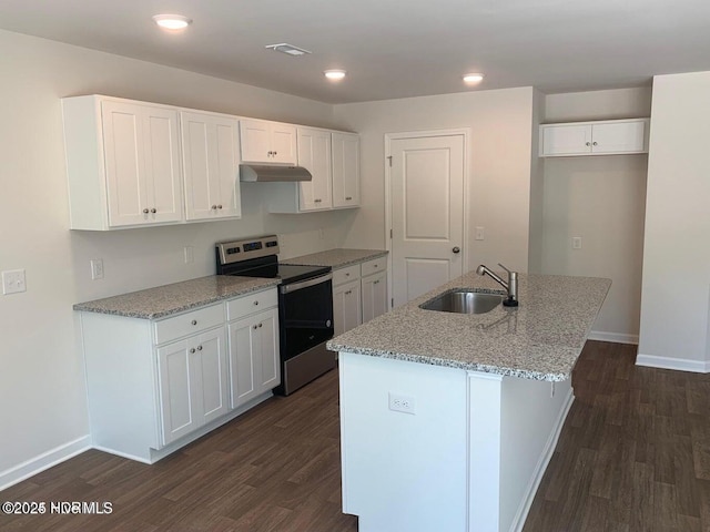 kitchen featuring white cabinets, dark wood finished floors, under cabinet range hood, electric stove, and a sink