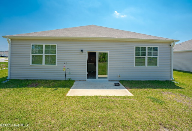 1741 Riverton Dr SE Lot 36, Bolivia, NC 28422 - back of property with a patio area and a lawn