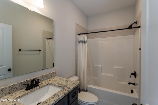 full bathroom featuring toilet, vanity, and shower / bath combo