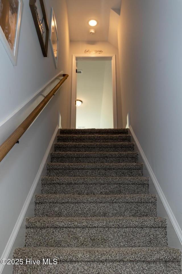 stairway with baseboards