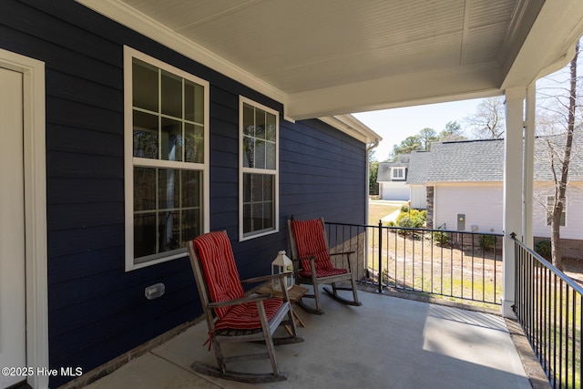 view of patio featuring a porch