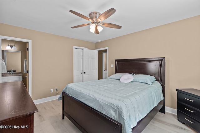 118 S 13th St, Wilmington, NC 28401 - bedroom with baseboards, a ceiling fan, a closet, and light wood-style flooring