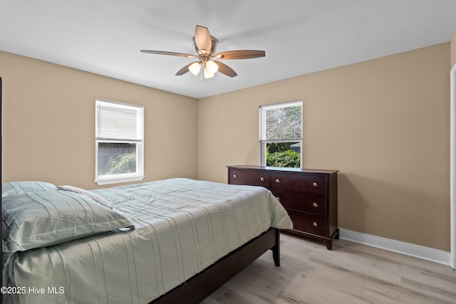 118 S 13th St, Wilmington, NC 28401 - bedroom with baseboards, ceiling fan, and light wood-style flooring
