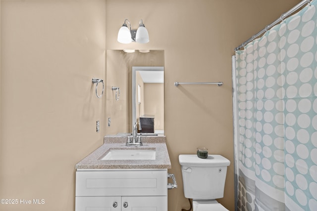 118 S 13th St, Wilmington, NC 28401 - full bathroom featuring vanity, toilet, and a shower with curtain
