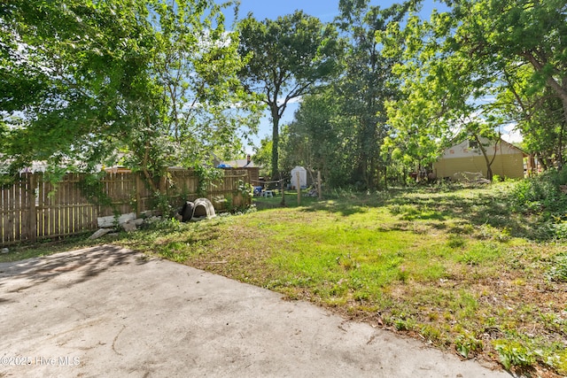 view of yard with fence