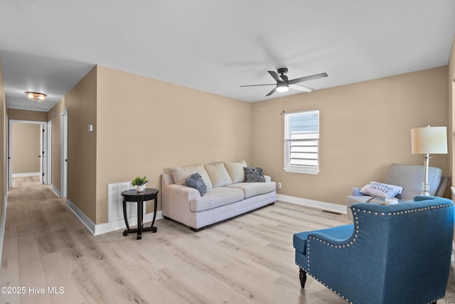 118 S 13th St, Wilmington, NC 28401 - living area with visible vents, a ceiling fan, baseboards, and light wood-type flooring