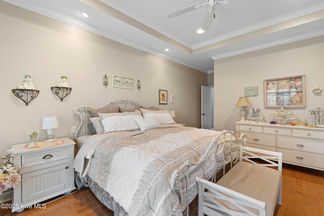 4106 Kittiwake Ct, Southport, NC 28461 - bedroom featuring dark wood-style floors, crown molding, recessed lighting, and a ceiling fan