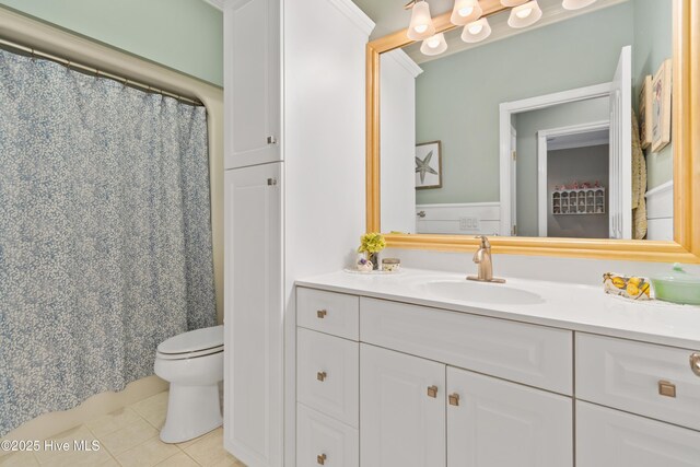 4106 Kittiwake Ct, Southport, NC 28461 - bathroom with tile patterned flooring, toilet, and vanity