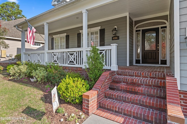 4106 Kittiwake Ct, Southport, NC 28461 - entrance to property featuring covered porch