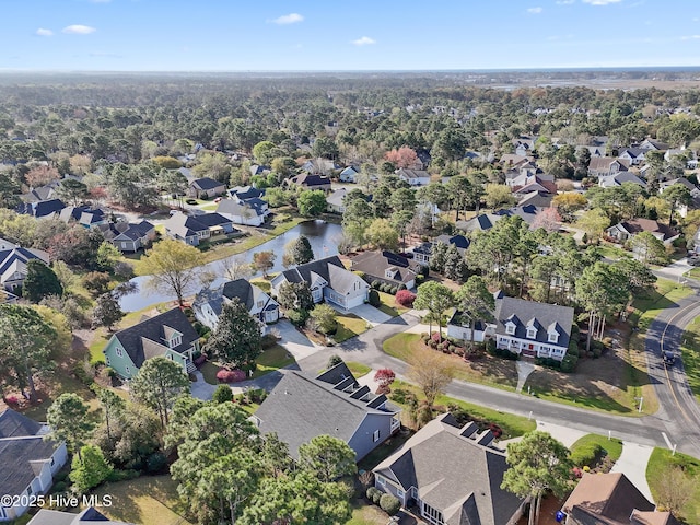 4106 Kittiwake Ct, Southport, NC 28461 - aerial view of property and surrounding area with nearby suburban area and a nearby body of water